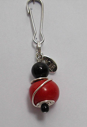 coral and black onyx pet charm.